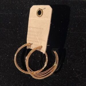 Anthropologie Wavy Hoop Earrings. NWT